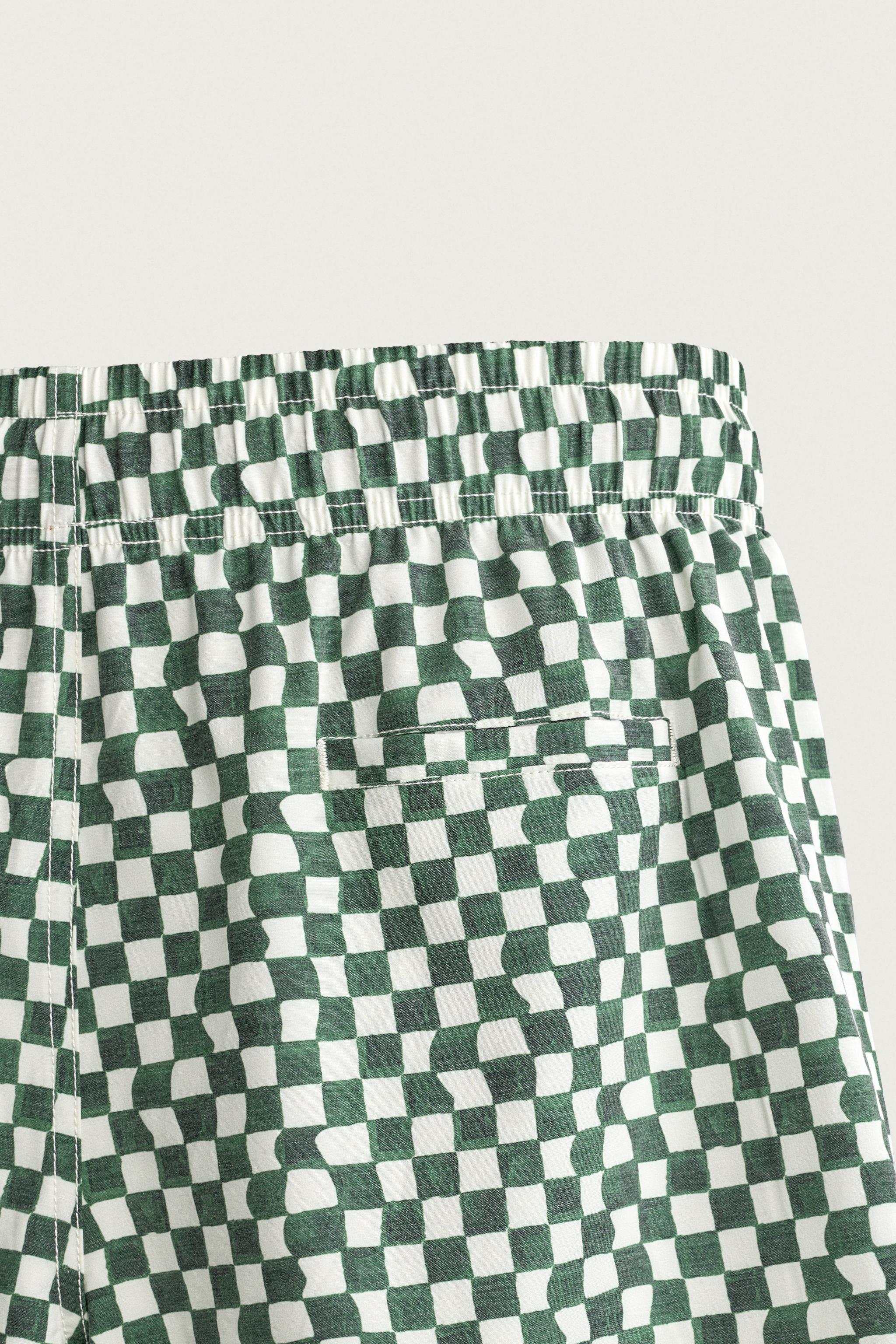 CHECKED LONG SWIM SHORTS